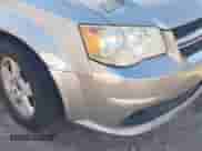 2013 Dodge Grand Caravan SXT with VIN 2C4RDGCG1DR580447, listed as a IAAI auction lot 43373907 with 265,396 mi miles and . Bid and sale history available at DreamBid. Image 6.