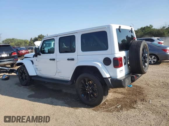 2023 Jeep Wrangler Sahara with VIN 1C4JJXP69PW556187, listed as a Copart auction lot 67539065 with 54,671 mi miles and Salvage title. Bid and sale history available at DreamBid. Image 2.