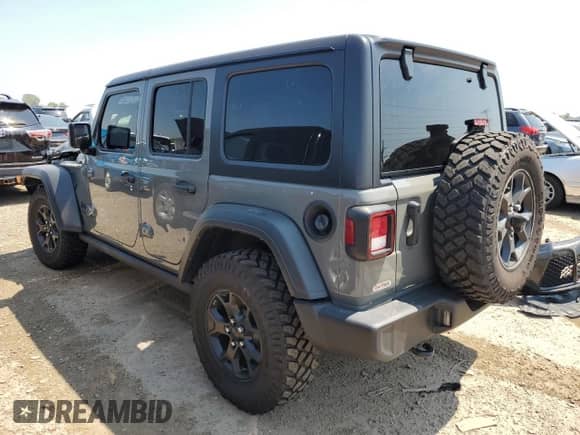 2021 Jeep Wrangler Unlimited Sport S with VIN 1C4HJXDN9MW832700, listed as a Copart auction lot 64761765 with 83,129 mi miles and Salvage title. Bid and sale history available at DreamBid. Image 2.