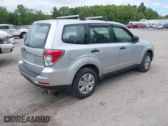 2009 Subaru Forester X z VIN JF2SH61649G791680, wystawiony jako IAAI lot #42305546 z przebiegiem 193 607 mil mil oraz . Historia ofert i sprzedaży dostępna na DreamBid. Obrazek 4.