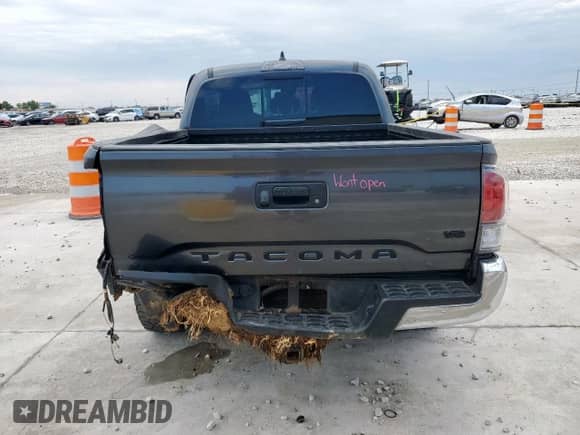 2022 Toyota Tacoma SR z VIN 3TMCZ5AN3NM500250, wystawiony jako Copart lot #69468185 z przebiegiem Nie podano mil oraz Szkoda całkowita • Salvage title. Historia ofert i sprzedaży dostępna na DreamBid. Obrazek 6.
