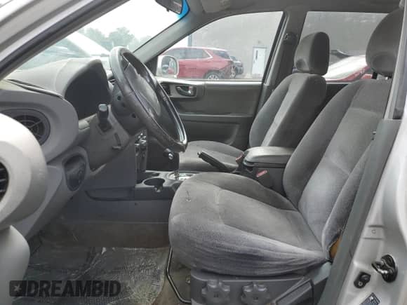 2003 Hyundai Santa Fe GLS z VIN KM8SC73D33U486383, wystawiony jako Copart lot #80148775 z przebiegiem 219 900 mil mil oraz Szkoda całkowita • Salvage title. Historia ofert i sprzedaży dostępna na DreamBid. Obrazek 7.