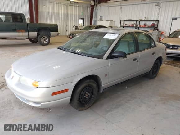 2000 Saturn SL with VIN 1G8ZG5284YZ239958, listed as a IAAI auction lot 42719252 with 247,452 mi miles and . Bid and sale history available at DreamBid. Image 2.