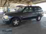 2003 Chevrolet TrailBlazer LT z VIN 1GNDS13S332384404, wystawiony jako Copart lot #64249895 z przebiegiem 153 810 mil mil oraz Czysty tytuł • Clean title. Historia ofert i sprzedaży dostępna na DreamBid. Obrazek 1.