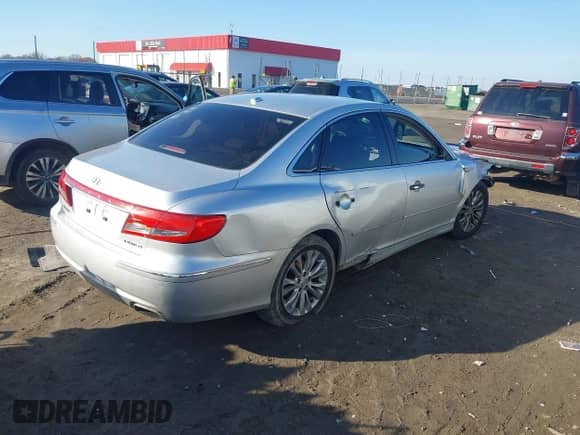 2011 Hyundai Azera Limited z VIN KMHFC4DF9BA526126, wystawiony jako IAAI lot #41149789 z przebiegiem 137 060 mil mil oraz . Historia ofert i sprzedaży dostępna na DreamBid. Obrazek 4.