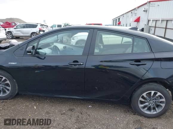 2022 Toyota Prius LE with VIN JTDKAMFU3N3187036, listed as a IAAI auction lot 43493399 with 98,731 mi miles and . Bid and sale history available at DreamBid. Image 15.