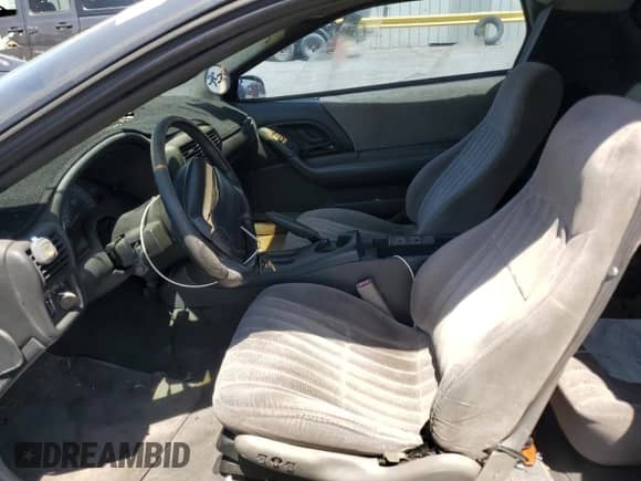 1997 Chevrolet Camaro Z28 с VIN 2G1FP22PXV2141166, выставлен на аукционе Copart как лот 61597885 с пробегом Не указан миль и Списание • Salvage title. История ставок и продаж доступна на DreamBid. Изображение 7.