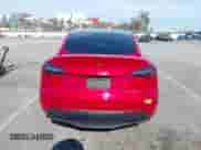 2022 Tesla Model Y Long Range z VIN 7SAYGDEE2NF352440, wystawiony jako IAAI lot #43041054 z przebiegiem 46 950 mil mil oraz . Historia ofert i sprzedaży dostępna na DreamBid. Obrazek 16.