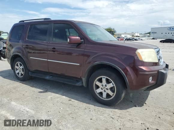 2010 Honda Pilot Touring с VIN 5FNYF4H97AB008479, выставлен на аукционе Copart как лот 63516435 с пробегом 204 150 миль миль и Чистый • Clean title. История ставок и продаж доступна на DreamBid. Изображение 4.