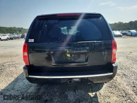 2013 Chevrolet Tahoe LTZ with VIN 1GNSKCE00DR140023, listed as a Copart auction lot 80993695 with 172,428 mi miles and Salvage title. Bid and sale history available at DreamBid. Image 6.