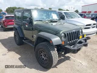 2007 Jeep Wrangler X с VIN 1J4FA24157L179077, выставлен на аукционе IAAI как лот 43074186 с пробегом 123 765 миль миль и . История ставок и продаж доступна на DreamBid. Изображение 1.
