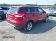 2014 Ford Escape SE with VIN 1FMCU0GX0EUB23605, listed as a IAAI auction lot 43273194 with 174,754 mi miles and . Bid and sale history available at DreamBid. Image 4.
