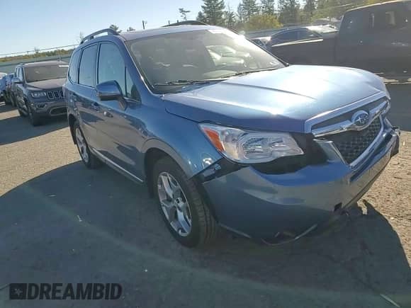 2015 Subaru Forester Touring with VIN JF2SJAWC5FH477385, listed as a Copart auction lot 86609875 with 65,497 mi miles and Salvage title. Bid and sale history available at DreamBid. Image 14.