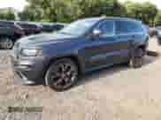 2014 Jeep Grand Cherokee SRT-8 z VIN 1C4RJFDJ2EC198810, wystawiony jako Copart lot #84599495 z przebiegiem 135 251 mil mil oraz Czysty tytuł • Clean title. Historia ofert i sprzedaży dostępna na DreamBid. Obrazek 1.
