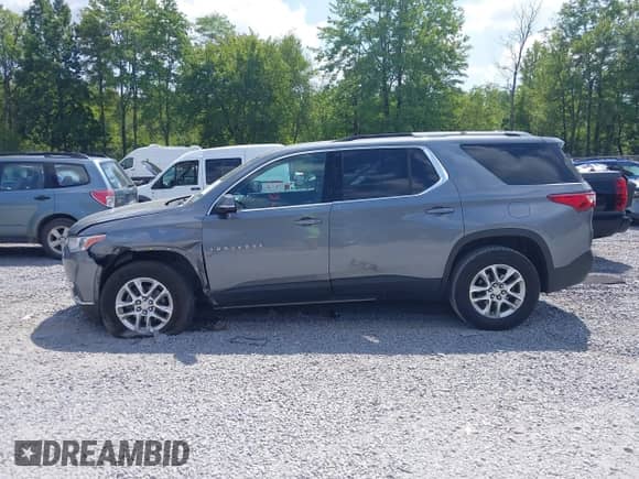 2018 Chevrolet Traverse LT Cloth z VIN 1GNEVGKW5JJ112135, wystawiony jako IAAI lot #43003312 z przebiegiem 94 126 mil mil oraz . Historia ofert i sprzedaży dostępna na DreamBid. Obrazek 14.