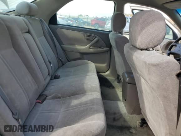 1997 Toyota Camry LE z VIN JT2BF22K8V0028288, wystawiony jako Copart lot #83981175 z przebiegiem 294 127 mil mil oraz Czysty tytuł • Clean title. Historia ofert i sprzedaży dostępna na DreamBid. Obrazek 11.