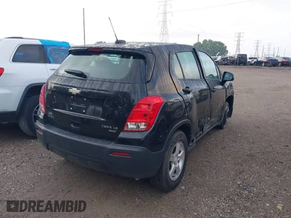 2016 Chevrolet Trax LS with VIN KL7CJNSB0GB607033, listed as a IAAI auction lot 42714403 with 153,502 mi miles and . Bid and sale history available at DreamBid. Image 4.