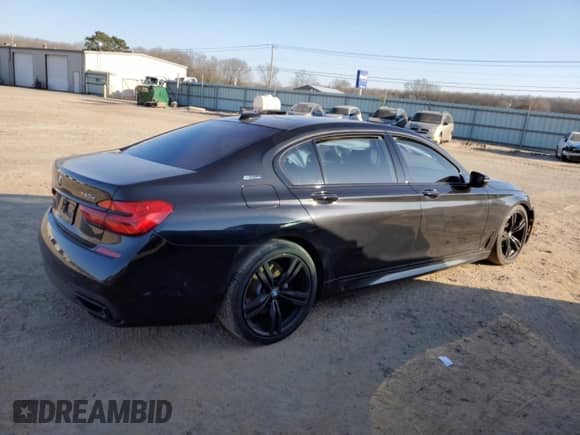 2018 BMW 7 Series 740e xDrive with VIN WBA7J2C53JG938305, listed as a Copart auction lot 87412354 with Not provided miles and Salvage title. Bid and sale history available at DreamBid. Image 3.