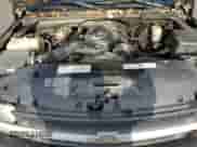 2001 Chevrolet Silverado 1500 LS z VIN 1GCEK19V21E103039, wystawiony jako Copart lot #83390404 z przebiegiem 190 176 mil mil oraz Szkoda całkowita • Salvage title. Historia ofert i sprzedaży dostępna na DreamBid. Obrazek 11.