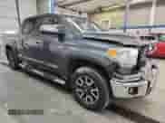 2017 Toyota Tundra Platinum with VIN 5TFAY5F1XHX635000, listed as a Copart auction lot 89438495 with 128,435 mi miles and Salvage title. Bid and sale history available at DreamBid. Image 4.