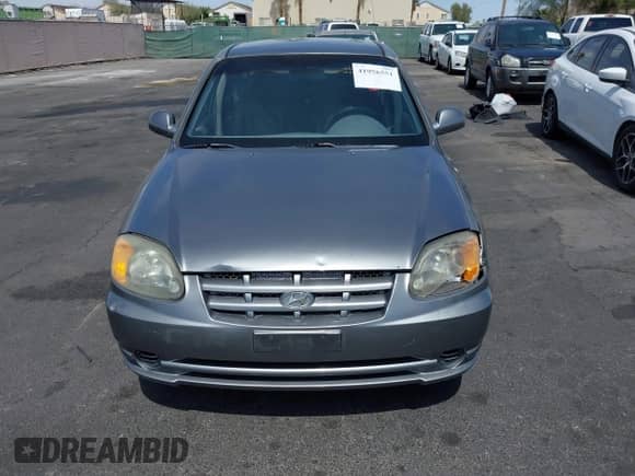 2003 Hyundai Accent GL с VIN KMHCG45C73U471607, выставлен на аукционе IAAI как лот 41956551 с пробегом 222 305 миль миль и . История ставок и продаж доступна на DreamBid. Изображение 6.