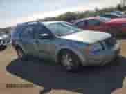 2005 Ford Freestyle SE with VIN 1FMZK01145GA23073, listed as a Copart auction lot 71931505 with 215,349 mi miles and Salvage title. Bid and sale history available at DreamBid. Image 4.