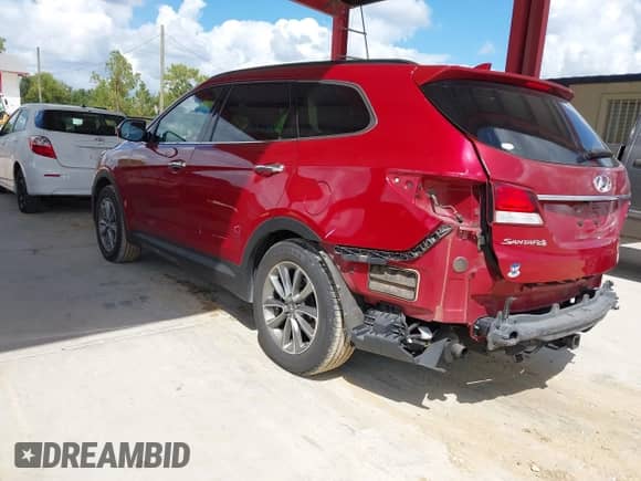 2017 Hyundai Santa Fe SE z VIN KM8SM4HF8HU212190, wystawiony jako IAAI lot #43356896 z przebiegiem 159 648 mil mil oraz . Historia ofert i sprzedaży dostępna na DreamBid. Obrazek 3.