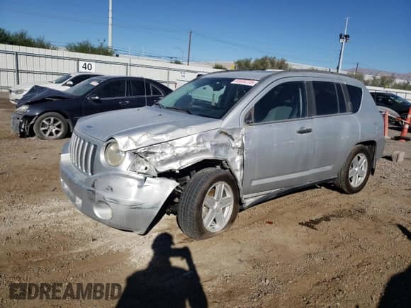 2007 Jeep Compass Sport with VIN 1J8FF47W47D136671, listed as a Copart auction lot 69504735 with Not provided miles and Salvage title. Bid and sale history available at DreamBid. Image 1.