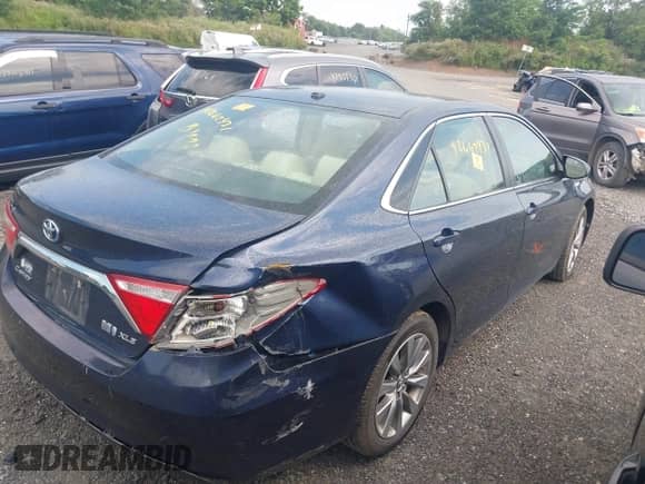 2015 Toyota Camry LE with VIN 4T1BD1FK8FU165173, listed as a IAAI auction lot 42662431 with 297,983 mi miles and . Bid and sale history available at DreamBid. Image 4.