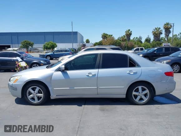 2005 Honda Accord EX-L with VIN 1HGCM56895A077478, listed as a IAAI auction lot 42590151 with 212,368 mi miles and . Bid and sale history available at DreamBid. Image 14.
