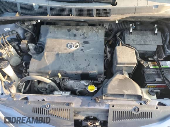 2015 Toyota Sienna LE with VIN 5TDKK3DC7FS647056, listed as a Copart auction lot 71981905 with 104,576 mi miles and Salvage title. Bid and sale history available at DreamBid. Image 12.