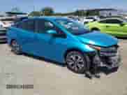 2018 Toyota Prius Plus with VIN JTDKARFP9J3081286, listed as a Copart auction lot 67827655 with 131,432 mi miles and Salvage title. Bid and sale history available at DreamBid. Image 4.