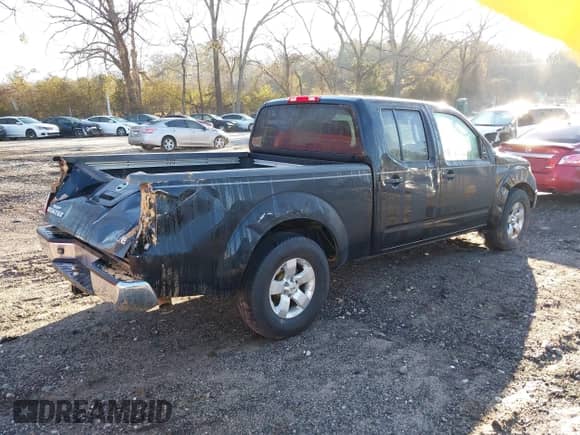 2009 Nissan Frontier LE z VIN 1N6AD09UX9C404043, wystawiony jako IAAI lot #41476388 z przebiegiem 198 612 mil mil oraz . Historia ofert i sprzedaży dostępna na DreamBid. Obrazek 4.