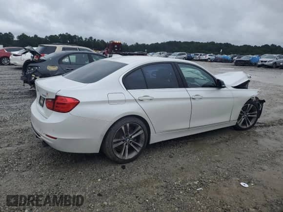 2015 BMW 3 Series 335i с VIN WBA3A9G55FNS66901, выставлен на аукционе Copart как лот 67543105 с пробегом 195 744 миль миль и Списание • Salvage title. История ставок и продаж доступна на DreamBid. Изображение 3.