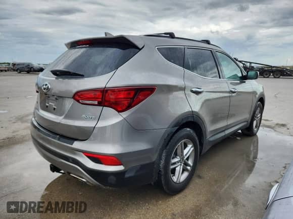 2017 Hyundai Santa Fe 2.4L z VIN 5NMZU3LB4HH046792, wystawiony jako Copart lot #82055665 z przebiegiem 149 385 mil mil oraz Czysty tytuł • Clean title. Historia ofert i sprzedaży dostępna na DreamBid. Obrazek 3.