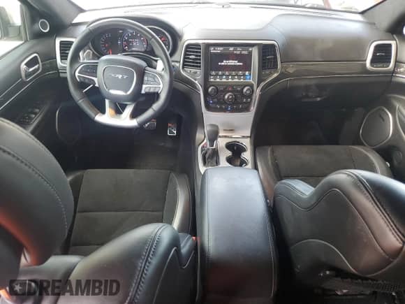 2018 Jeep Grand Cherokee SRT с VIN 1C4RJFDJ5JC397246, выставлен на аукционе Copart как лот 57310555 с пробегом 79 552 миль миль и Списание • Salvage title. История ставок и продаж доступна на DreamBid. Изображение 8.