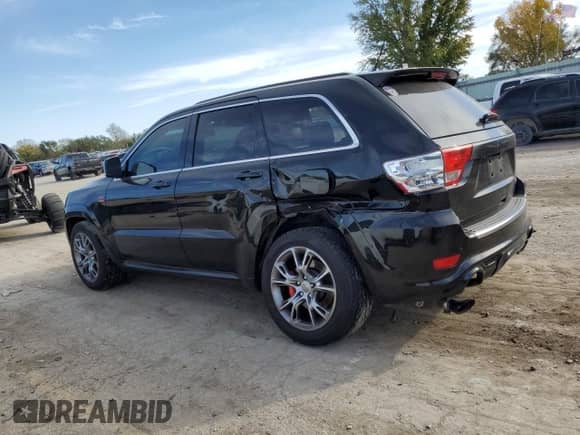 2012 Jeep Grand Cherokee SRT-8 z VIN 1C4RJFDJ7CC100156, wystawiony jako Copart lot #79865954 z przebiegiem 113 782 mil mil oraz Szkoda całkowita • Salvage title. Historia ofert i sprzedaży dostępna na DreamBid. Obrazek 2.