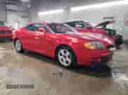 2003 Hyundai Tiburon с VIN KMHHM65D73U018137, выставлен на аукционе Copart как лот 50370215 с пробегом 162 258 миль миль и Списание • Salvage title. История ставок и продаж доступна на DreamBid. Изображение 4.
