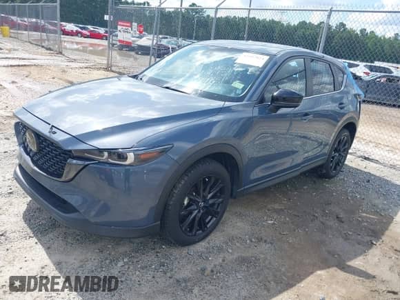 2022 Mazda CX-5 S Preferred z VIN JM3KFBCM4N0532335, wystawiony jako IAAI lot #42507024 z przebiegiem Nie podano mil oraz . Historia ofert i sprzedaży dostępna na DreamBid. Obrazek 17.