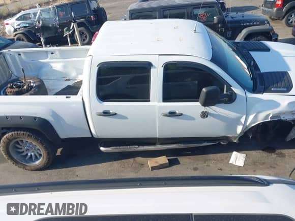 2014 Chevrolet Silverado 2500HD Work Truck z VIN 1GC1KVCG6EF144919, wystawiony jako IAAI lot #42968279 z przebiegiem 145 810 mil mil oraz . Historia ofert i sprzedaży dostępna na DreamBid. Obrazek 14.
