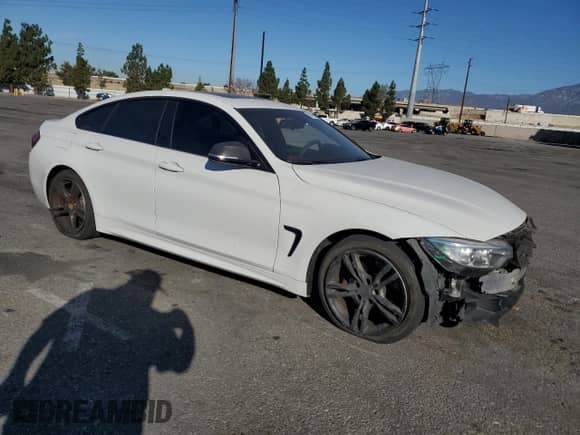 2015 BMW 4 Series 428i z VIN WBA4A9C58FGL85766, wystawiony jako Copart lot #69790975 z przebiegiem 93 413 mil mil oraz Szkoda całkowita • Salvage title. Historia ofert i sprzedaży dostępna na DreamBid. Obrazek 4.