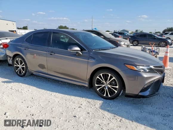 2019 Toyota Camry Hybrid SE с VIN 4T1B21HK4KU517243, выставлен на аукционе Copart как лот 83873985 с пробегом 99 571 миль миль и Списание • Salvage title. История ставок и продаж доступна на DreamBid. Изображение 4.