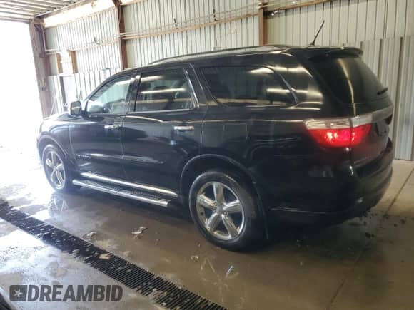 2013 Dodge Durango Citadel с VIN 1C4RDJEG8DC500760, выставлен на аукционе Copart как лот 63512395 с пробегом 107 513 миль миль и Списание • Salvage title. История ставок и продаж доступна на DreamBid. Изображение 2.
