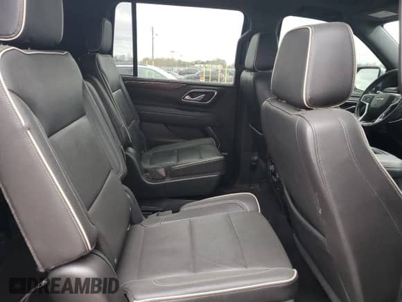 2021 Chevrolet Suburban Premier z VIN 1GNSKFKDXMR343753, wystawiony jako Copart lot #52889585 z przebiegiem 91 505 mil mil oraz Szkoda całkowita • Salvage title. Historia ofert i sprzedaży dostępna na DreamBid. Obrazek 11.