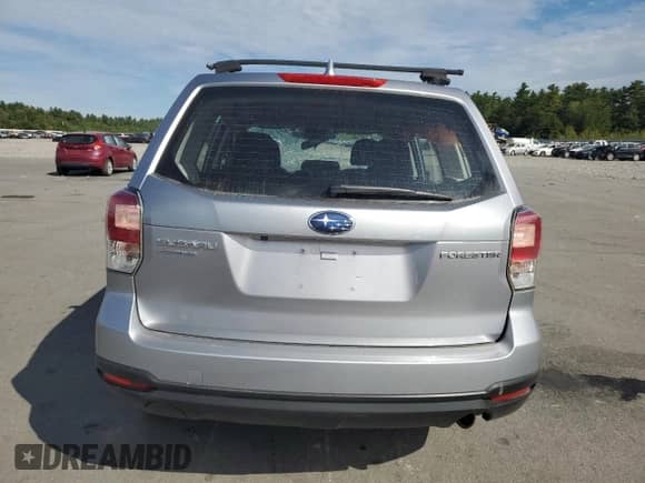 2018 Subaru Forester z VIN JF2SJAAC4JG486312, wystawiony jako Copart lot #81035025 z przebiegiem 51 120 mil mil oraz Szkoda całkowita • Salvage title. Historia ofert i sprzedaży dostępna na DreamBid. Obrazek 6.
