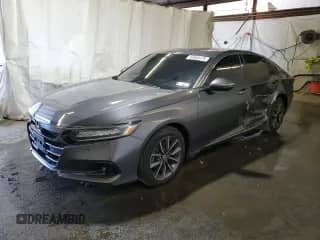 2021 Honda Accord EX-L with VIN 1HGCV1F54MA091590, listed as a Copart auction lot 84963475 with 54,052 mi miles and Salvage title. Bid and sale history available at DreamBid. Image 1.