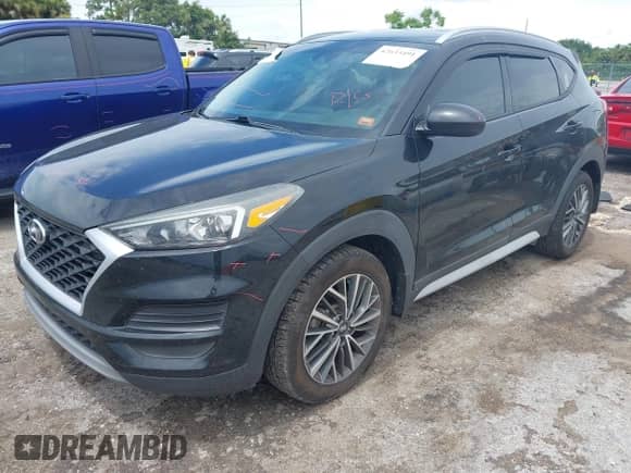 2019 Hyundai Tucson SEL with VIN KM8J33AL7KU056577, listed as a IAAI auction lot 42633491 with 94,274 mi miles and . Bid and sale history available at DreamBid. Image 17.