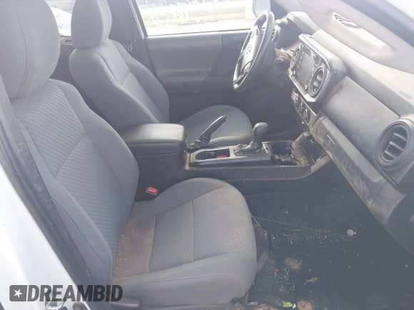 2020 Toyota Tacoma SR with VIN 5TFRX5GN8LX179711, listed as a IAAI auction lot 43384659 with 79,537 mi miles and . Bid and sale history available at DreamBid. Image 5.