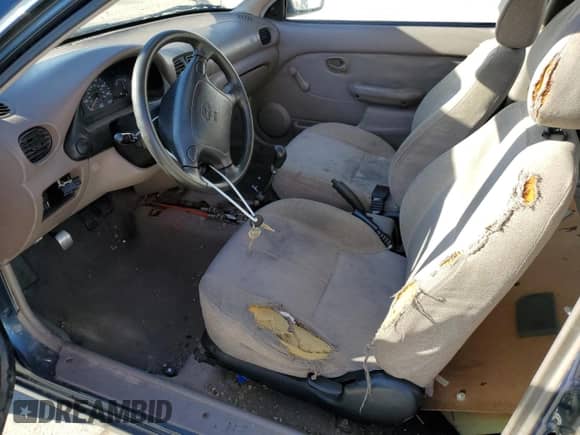 1999 Hyundai Accent L z VIN KMHVD14N3XU456921, wystawiony jako Copart lot #44805175 z przebiegiem 112 134 mil mil oraz Czysty tytuł • Clean title. Historia ofert i sprzedaży dostępna na DreamBid. Obrazek 7.