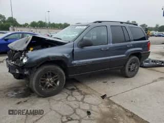 2003 Jeep Grand Cherokee Laredo with VIN 1J4GW48N83C584214, listed as a Copart auction lot 63453995 with 312,599 mi miles and Salvage title. Bid and sale history available at DreamBid. Image 1.